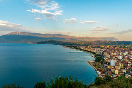 Pogradec sweeps along Lake Ohrid in southeastern Albania, unveiling a vibrant waterfront, hillside...