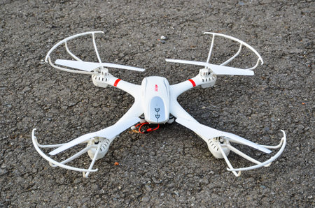 white drone on the ground