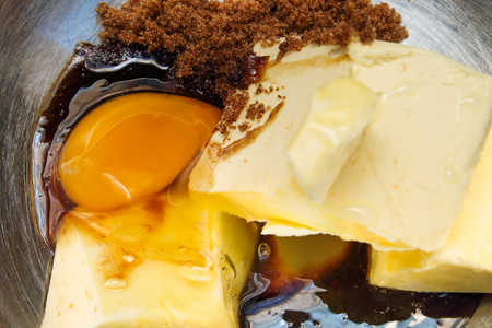 Preparations for cake making - cake ingredients - Egg, butter, sugar, flourの写真素材