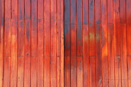dark wood board use for background. Old wooden planks Dark brown background Old vintage wallpaperの写真素材