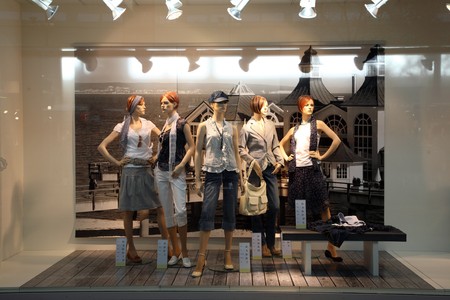 Female mannequins in clothing store. Female mannequins in clothing store.