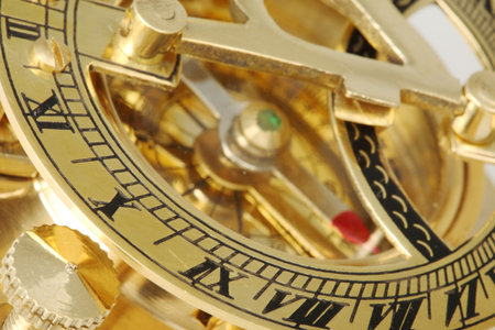 Part of antique compass with sundial.
