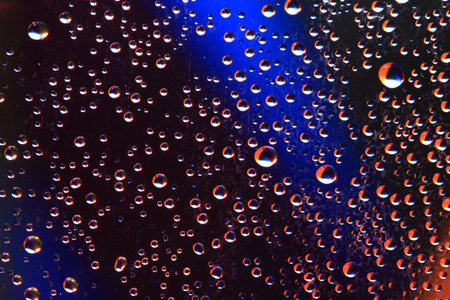 Drops of water on a blue background.