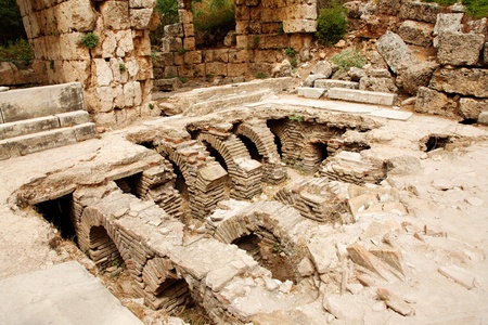 Ruins of ancient public Roman baths in Perge, Antalya, Turkeyの写真素材