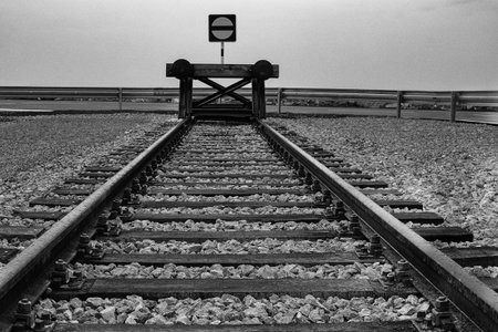 End of railway with sleepers and block
