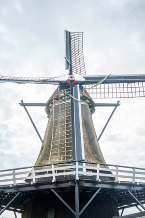 Traditional Dutch windmill in the village of Zaanse Schans, Netherlands
