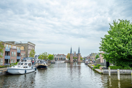 Canal of Sneek with gate and boats, Netherlands.の写真素材