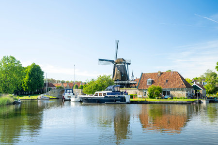 Traditional Dutch windmills in Sloten, Netherlandsの写真素材