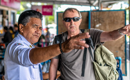 Philippines, Bohol 03 05 2019: Man showing direction to a tourist