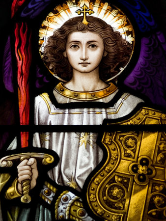 Stained glass in Catholic church in Dublin showing Archangel MichaelThe stained-glass windows are by...