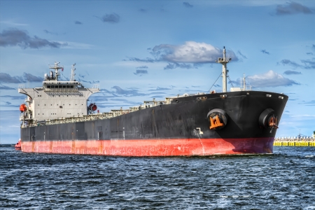 A huge ship heading for a port の写真素材