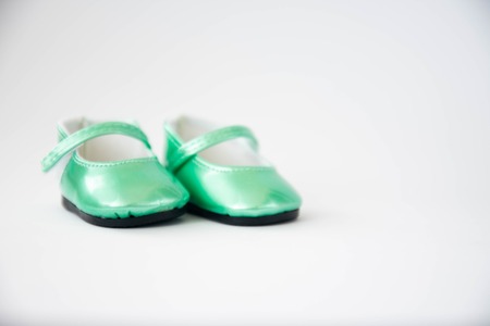 Cute shoes for dolls on white background. Art soft focusの写真素材