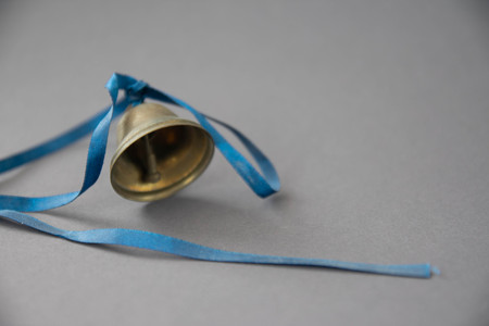 Bell for school on grey background. Art soft focus.の写真素材