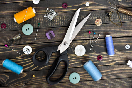 Sewing tools collection. Isolated on brown. art soft focus