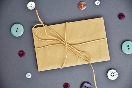 brown envelope on a gray background.