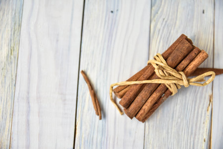 Cinnamon sticks on wooden table. Art soft focus.の写真素材
