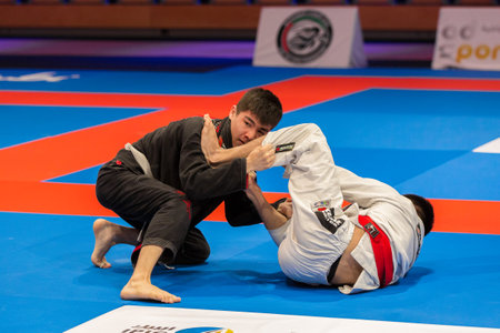 ABU DHABI, UAE - APRIL 19, 2016: ABU DHABI WORLD PROFESSIONAL JIU-JITSU CHAMPIONSHIP 2016 in the IPIC ARENA. Fighters on the floorのeditorial素材
