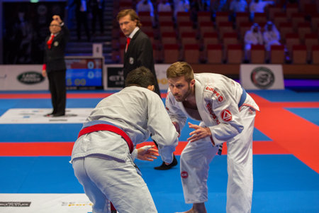 ABU DHABI, UAE - APRIL 19, 2016: ABU DHABI WORLD PROFESSIONAL JIU-JITSU CHAMPIONSHIP 2016 in the IPIC ARENA. Fighters fighting.のeditorial素材