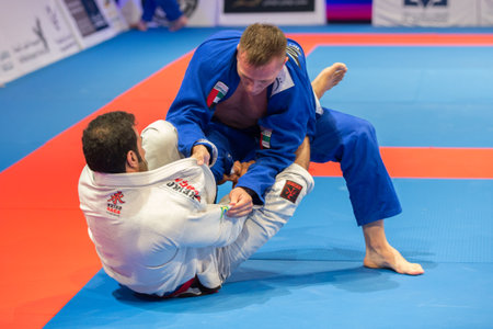 ABU DHABI, UAE - APRIL 19, 2016: ABU DHABI WORLD PROFESSIONAL JIU-JITSU CHAMPIONSHIP 2016 in the IPIC ARENA. Fighters fight in parterre.のeditorial素材