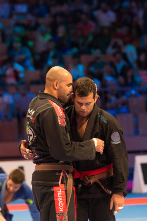 ABU DHABI, UAE - APRIL 19, 2016: ABU DHABI WORLD PROFESSIONAL JIU-JITSU CHAMPIONSHIP 2016 in the IPIC ARENA. Two fighters communicate.のeditorial素材