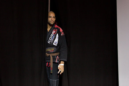 ABU DHABI, UAE - APRIL 19, 2016: ABU DHABI WORLD PROFESSIONAL JIU-JITSU CHAMPIONSHIP 2016 in the IPIC ARENA. UAE fighter with medal on the podium.のeditorial素材