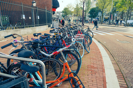 A lot of different bicycles on the street of Amsterdam, Netherlands.の写真素材