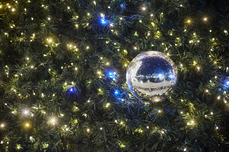 Garland with big ball decoration on the Christmas tree.の写真素材