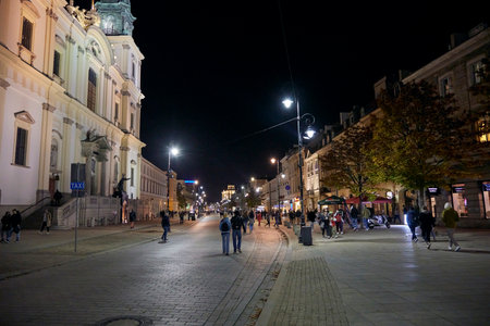 Walking pedestrian street in Warsaw at night, Poland.のeditorial素材