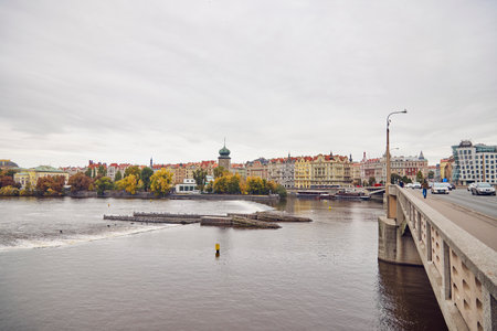 Prague cityscape in autumn with colorful trees. View from the bridge.の写真素材