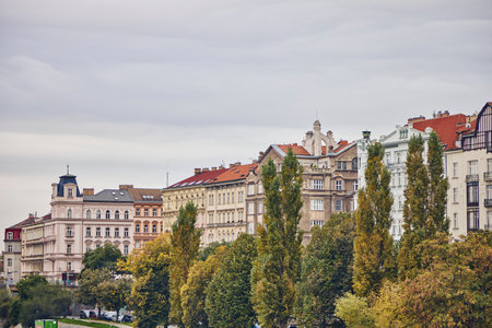Prague buildings through the trees in autumn.の写真素材