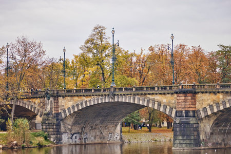 Stone old bridge above the Vltava river in Prague.の写真素材