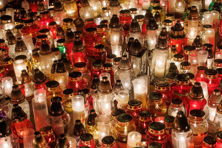 Decorative votive candles during All Hallows Day at the cemetery.の写真素材
