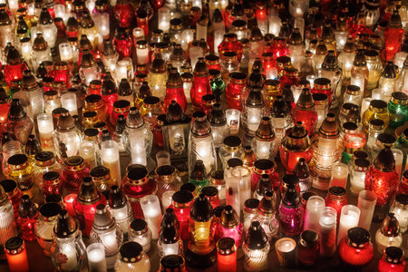 Decorative votive candles during All Saints Day at the cemetery.の写真素材
