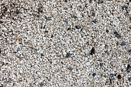 Background of grey small gravel on the pathway.の写真素材