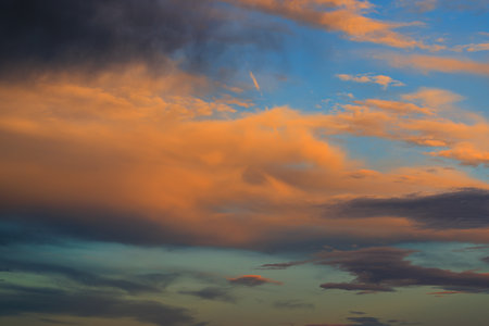 Gentle sunset orange and blue skyの写真素材