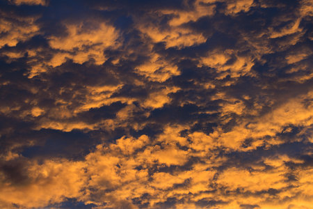 Colorful dramatic sky with cloud at sunsetの写真素材