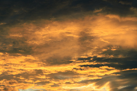 Orange and blue dramatic sunset at evening.の写真素材