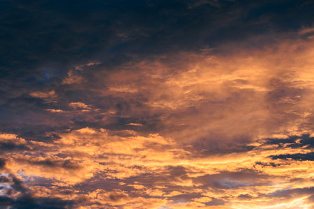 Purple and dark blue and violet dramatic sunset at evening.の写真素材