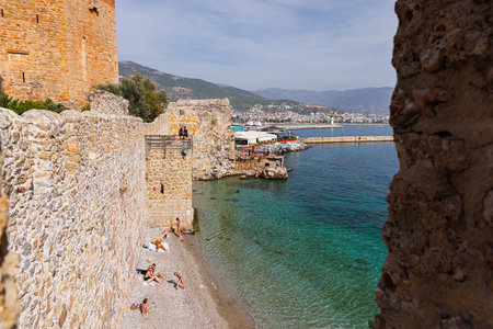 Beach near the Red Tower in Alanya, Turkey.の写真素材