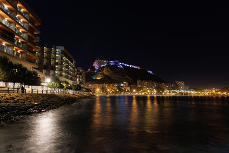 View of the illuminated Alicante from the sea at night.の写真素材