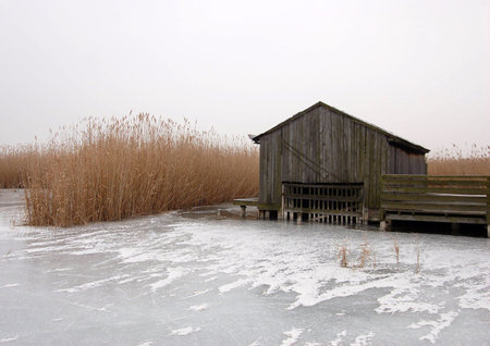 Hut in Frozen Lakeの写真素材
