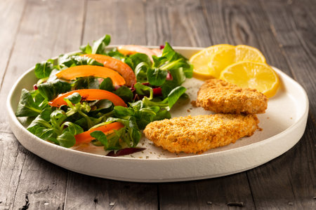 Salmon trout fish fillet on a white plate