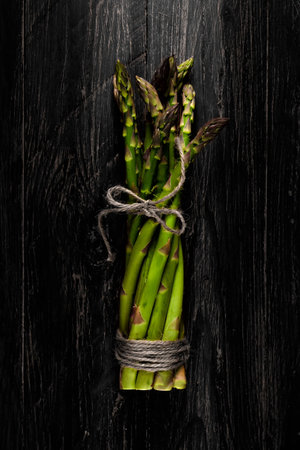 Green asparagus tied with a stringの写真素材