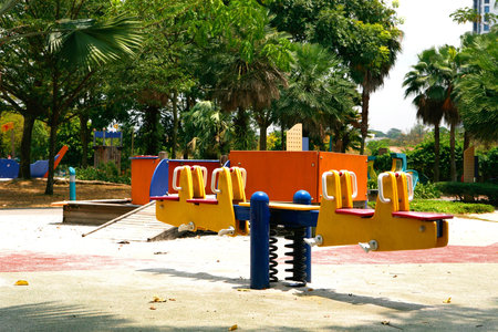 Colorful see saw in children's playground in the topicsの写真素材