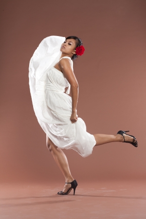 Beautiful flamenco dancer in white dressの写真素材