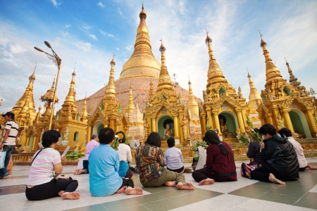 YANGON, MYANMAR - JAN 28  Buddhist devotees praying at the full moon festival, Shwedagon Pagoda, January 28, 2010 in Myanmar  Burma  のeditorial素材