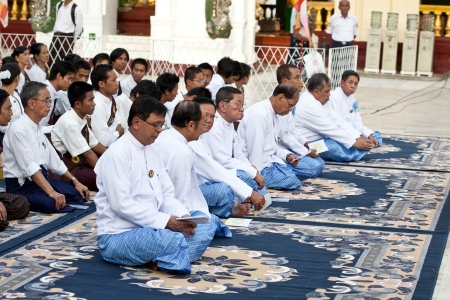 YANGON, MYANMAR - JAN 28  Buddhist devotees praying at the full moon festival, Shwedagon Pagoda, January 28, 2010 in Myanmar  Burma  のeditorial素材