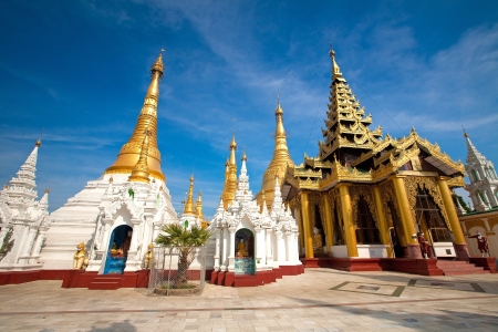 Ornate golden temple shrine encircling the main structure at Shwedagon Pagoda, Yangon, Myanmar の写真素材