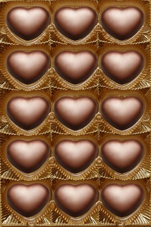 Open box of chocolate hearts.の写真素材