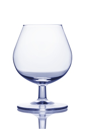 Close-up of empty cognac glass isolated on the white backgroundの写真素材